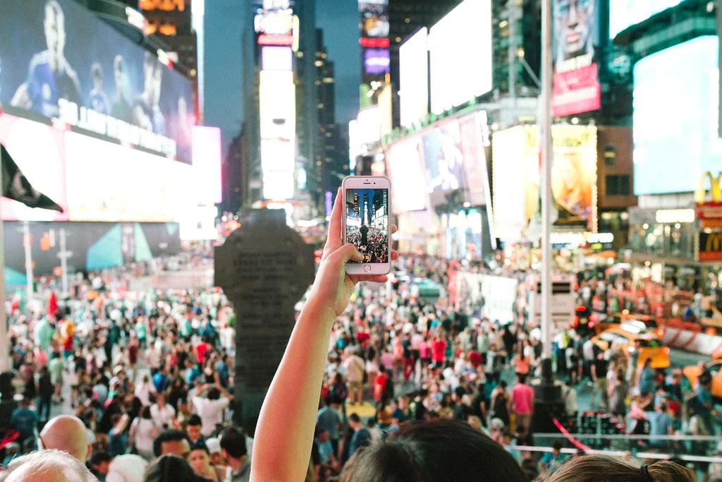 Transparent underwater dome venue with marine life swimming around performance space